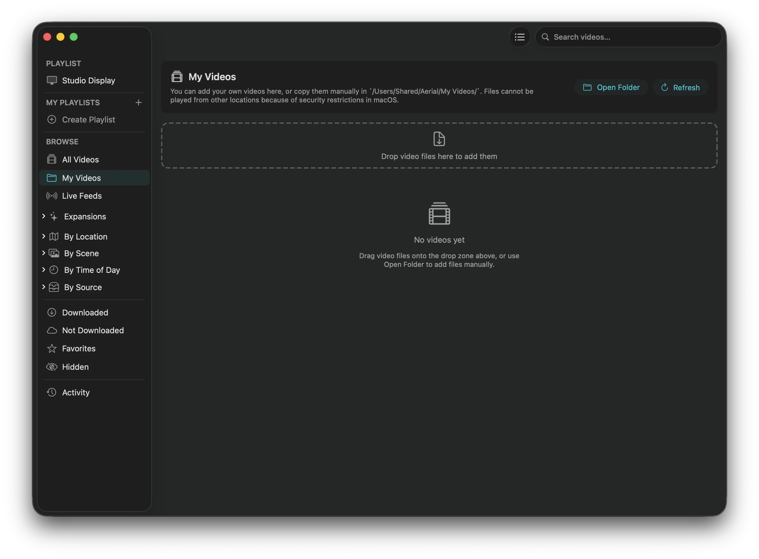 The My Videos section of Aerial's Video Library, with a large drop zone for adding your own video files.