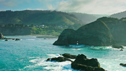 Rugged sea stacks rise from the churning Pacific along California's wild Mendocino coastline.