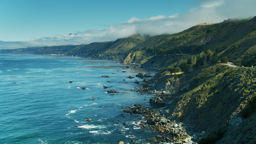Rugged cliffs and turquoise waters define the wild California coastline.
